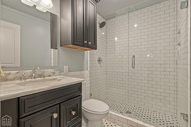 803 Fairway Dr, Jonesboro, AR 72401 - bathroom featuring ornamental molding, toilet, a shower stall, and vanity