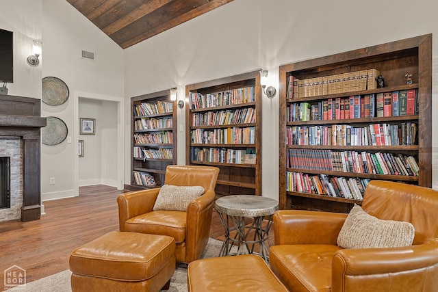 803 Fairway Dr, Jonesboro, AR 72401 - sitting room featuring visible vents, built in features, baseboards, wooden ceiling, and wood finished floors