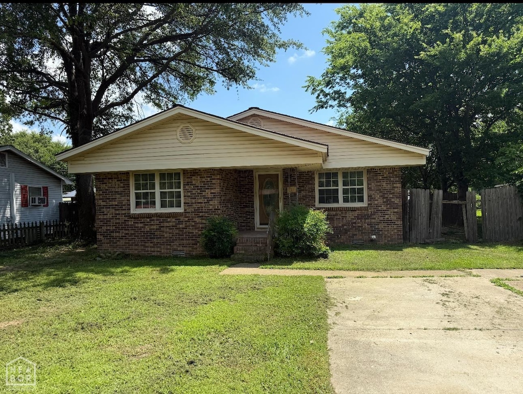812 Swaney Ave, Trumann, AR 72472 - view of front of property featuring brick siding and crawl space