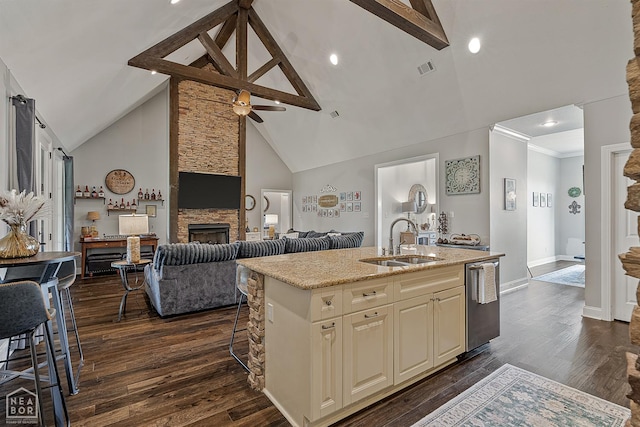 3293 Abigail Ct, Jonesboro, AR 72404 - kitchen with stainless steel dishwasher, a sink, high vaulted ceiling, open floor plan, and ceiling fan