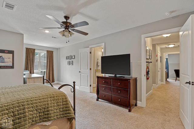 3293 Abigail Ct, Jonesboro, AR 72404 - bedroom featuring light carpet, baseboards, ceiling fan, and a textured ceiling