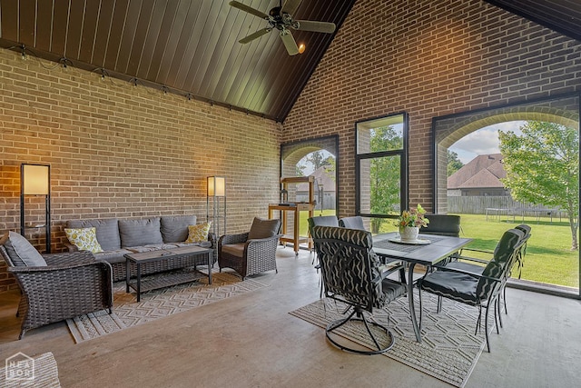 3293 Abigail Ct, Jonesboro, AR 72404 - sunroom / solarium featuring an outdoor hangout area, a ceiling fan, outdoor dining space, and lofted ceiling