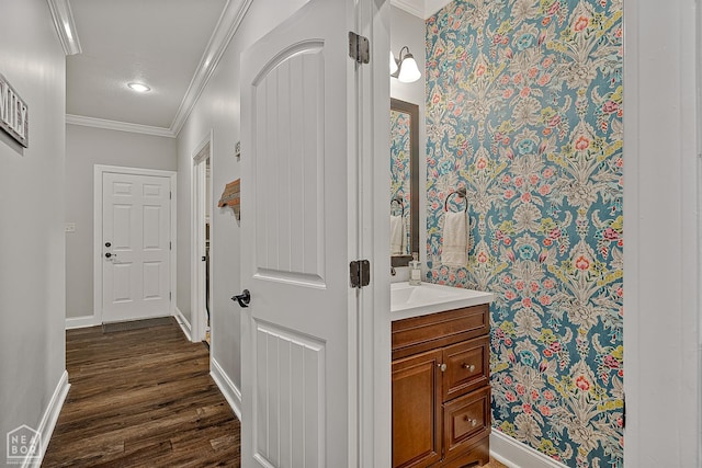 3293 Abigail Ct, Jonesboro, AR 72404 - bathroom featuring vanity, wood finished floors, baseboards, ornamental molding, and recessed lighting