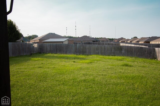 2404 Judes Ct, Jonesboro, AR 72404 - fenced backyard featuring a residential view