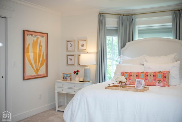 1105 Cardinal Rd, Jonesboro, AR 72401 - bedroom with crown molding and light carpet