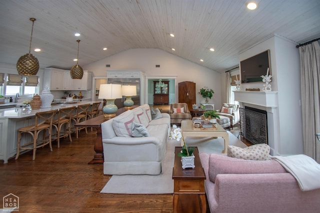 1105 Cardinal Rd, Jonesboro, AR 72401 - living room with lofted ceiling, dark wood-type flooring, recessed lighting, a fireplace, and wood ceiling