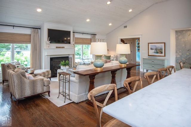1105 Cardinal Rd, Jonesboro, AR 72401 - living room with wood finished floors, a fireplace with flush hearth, recessed lighting, and high vaulted ceiling