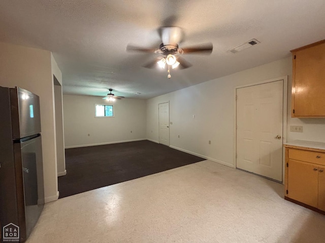 204 SE 4th St E, Walnut Ridge, AR 72476 - unfurnished living room featuring ceiling fan and baseboards