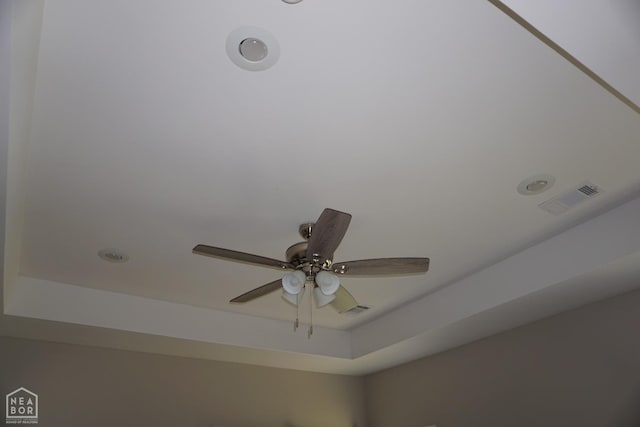 room details with visible vents and ceiling fan