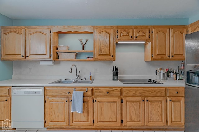 kitchen with refrigerator with ice dispenser, dishwasher, light countertops, a sink, and black electric cooktop