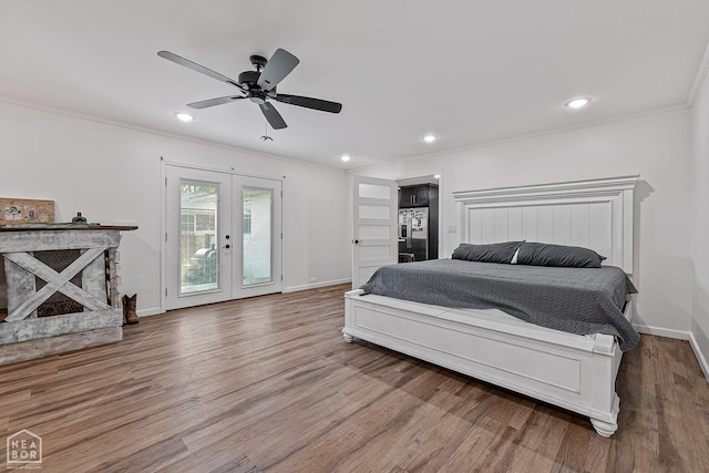 608 Finch Ave, Monette, AR 72447 - bedroom with access to outside, wood finished floors, ornamental molding, french doors, and baseboards
