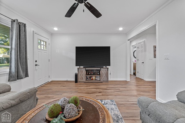 608 Finch Ave, Monette, AR 72447 - living room with crown molding, a ceiling fan, wood finished floors, baseboards, and recessed lighting