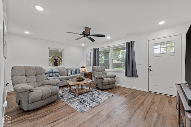 608 Finch Ave, Monette, AR 72447 - living area featuring light wood-style flooring, ornamental molding, ceiling fan, recessed lighting, and baseboards