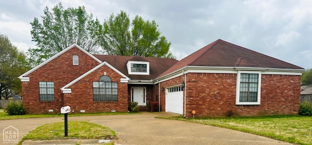 2208 John Cir, Newport, AR 72112 - view of front facade with brick siding, crawl space, an attached garage, and driveway