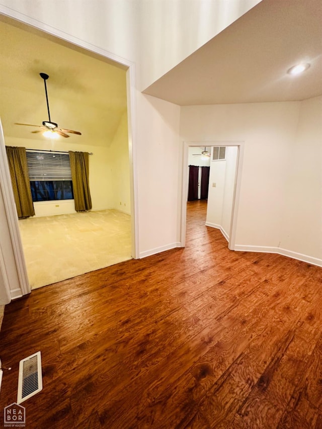 2208 John Cir, Newport, AR 72112 - empty room featuring visible vents, baseboards, wood finished floors, and ceiling fan