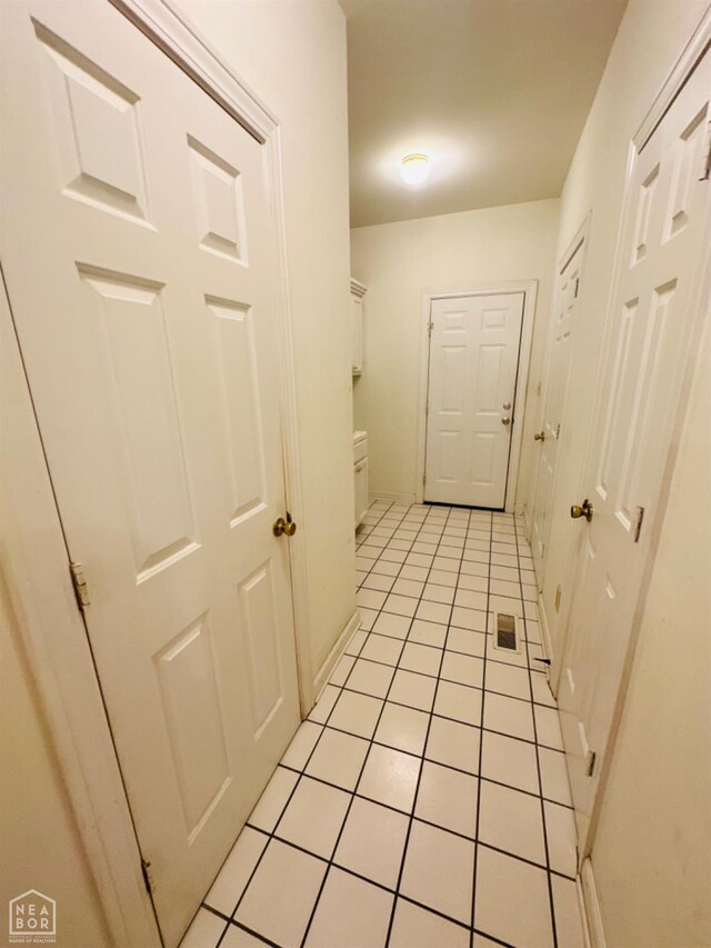 2208 John Cir, Newport, AR 72112 - hall featuring light tile patterned flooring