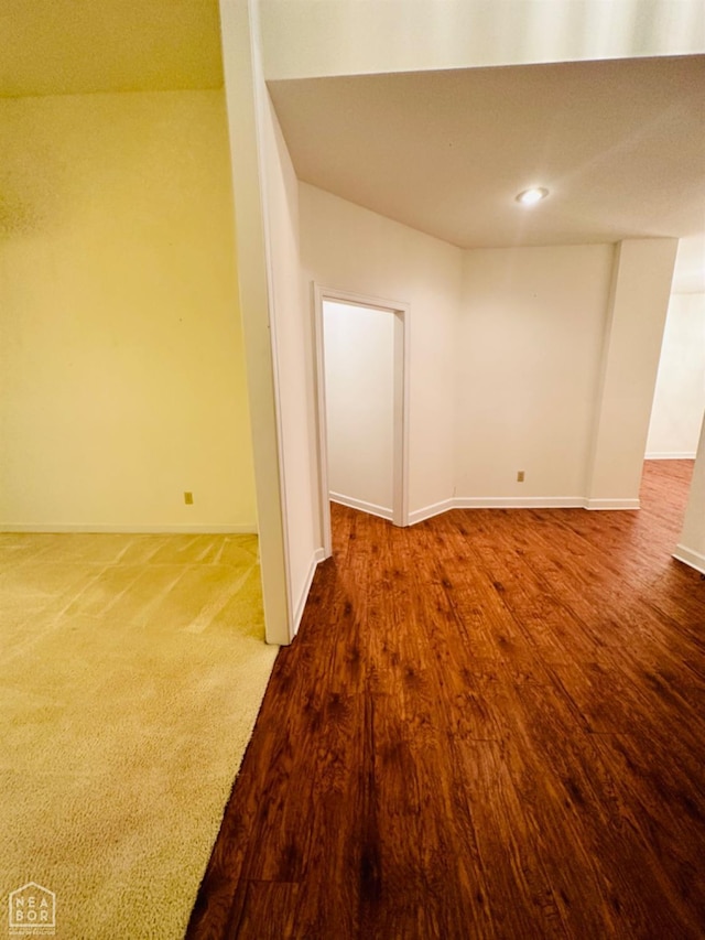 2208 John Cir, Newport, AR 72112 - empty room with baseboards, recessed lighting, and wood finished floors