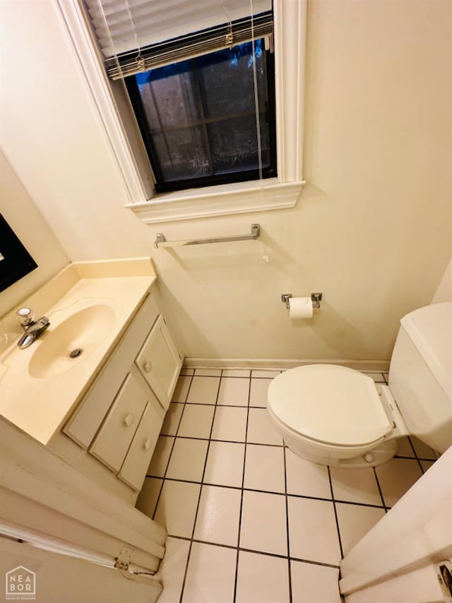 2208 John Cir, Newport, AR 72112 - half bath with toilet, vanity, and tile patterned flooring