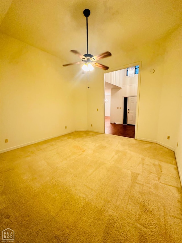 2208 John Cir, Newport, AR 72112 - spare room featuring carpet flooring, baseboards, and a ceiling fan