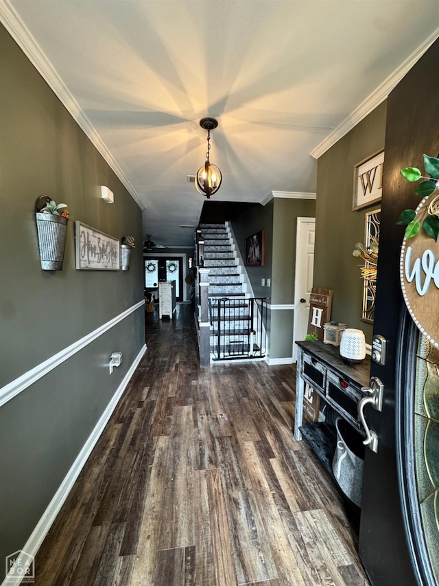515 6th, Marked Tree, AR 72365 - hall featuring stairway, wood finished floors, and crown molding