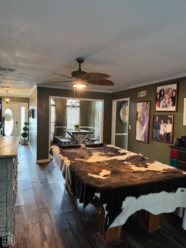 515 6th, Marked Tree, AR 72365 - recreation room featuring a ceiling fan, crown molding, dark wood-style flooring, and healthy amount of natural light