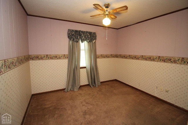 1704 Rector Rd, Paragould, AR 72450 - spare room featuring ornamental molding, a ceiling fan, and carpet flooring
