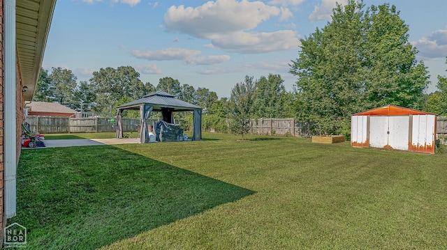 5010 S 28th St, Paragould, AR 72450 - fenced backyard featuring a gazebo, a storage shed, and a patio area