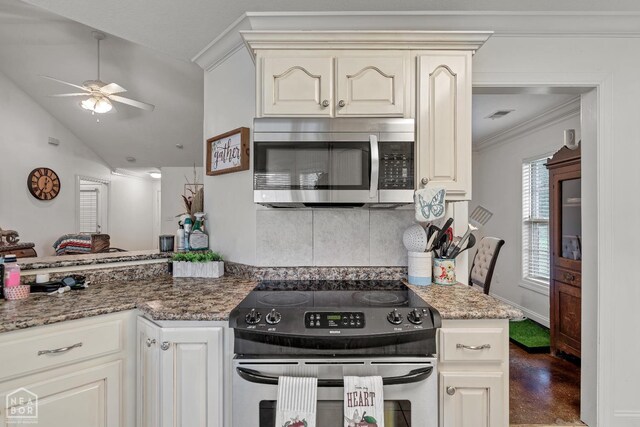430 County Road 751, Jonesboro, AR 72405 - kitchen featuring stainless steel microwave, electric range, crown molding, ceiling fan, and decorative backsplash
