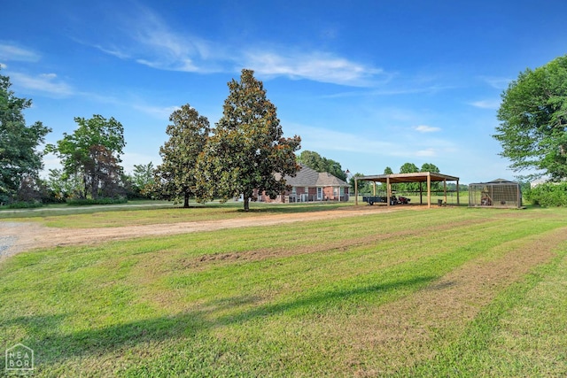 430 County Road 751, Jonesboro, AR 72405 - view of green lawn featuring a detached carport