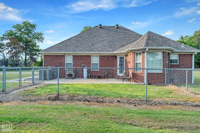 430 County Road 751, Jonesboro, AR 72405 - rear view of property with brick siding, a shingled roof, and a patio area