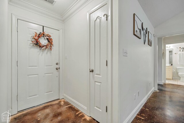 430 County Road 751, Jonesboro, AR 72405 - entryway featuring baseboards, concrete floors, and crown molding