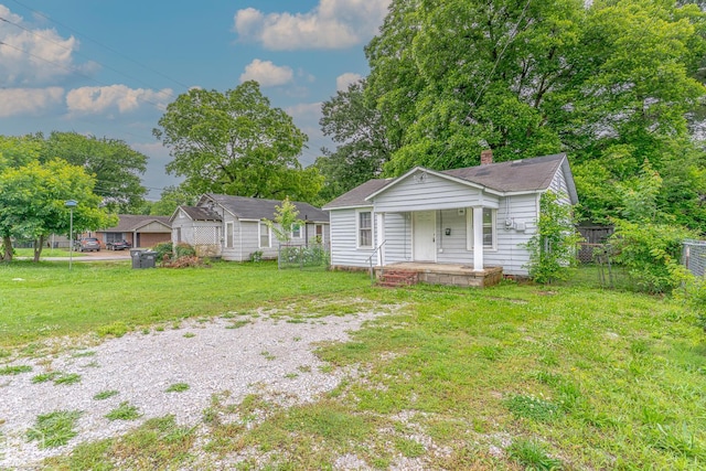 403 N Bridge St, Jonesboro, AR 72401 - view of front of property featuring a porch and a chimney