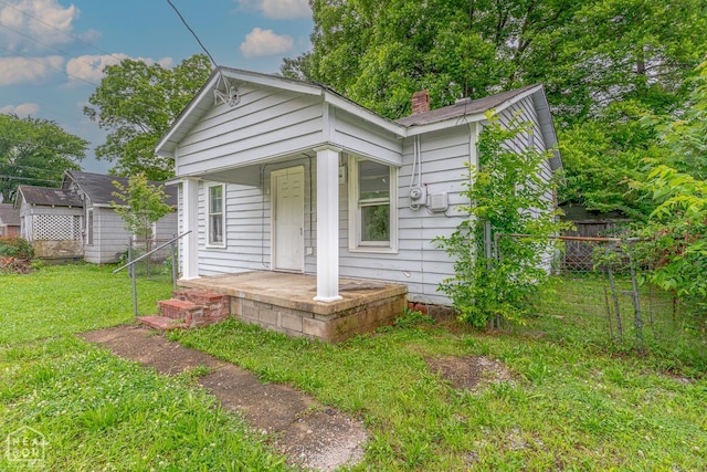 403 N Bridge St, Jonesboro, AR 72401 - shotgun-style home with a chimney