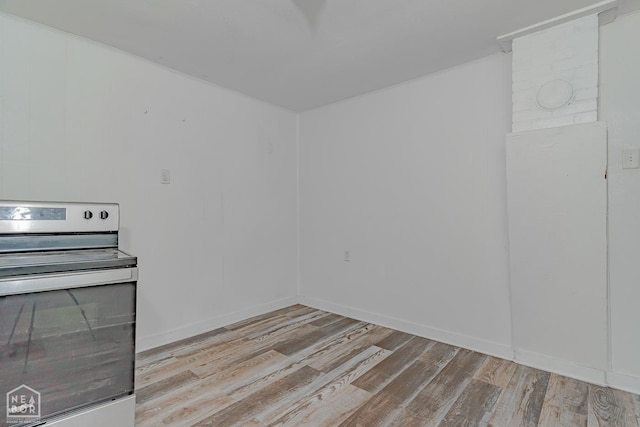 403 N Bridge St, Jonesboro, AR 72401 - empty room featuring wood finished floors and baseboards