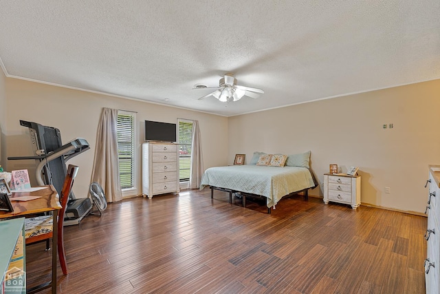 406 E Ash St E, Keiser, AR 72351 - bedroom with wood finished floors, a textured ceiling, a ceiling fan, and ornamental molding