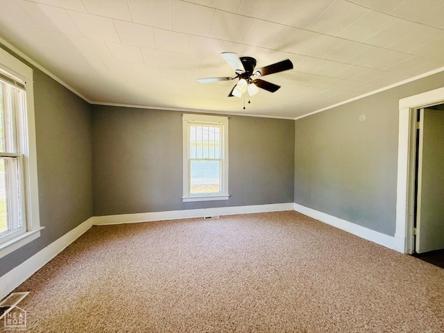 505 N Pruett St N, Paragould, AR 72450 - carpeted spare room featuring crown molding and a ceiling fan