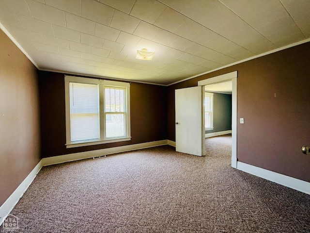 505 N Pruett St N, Paragould, AR 72450 - empty room featuring crown molding and carpet floors