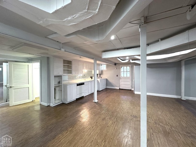 582 N 4th Ave, Piggott, AR 72454 - basement featuring baseboards and dark wood finished floors