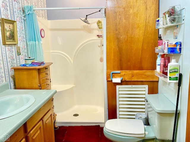 3601 Palestine Rd, Warm Springs, AR 72478 - bathroom with vanity, wallpapered walls, a stall shower, and toilet
