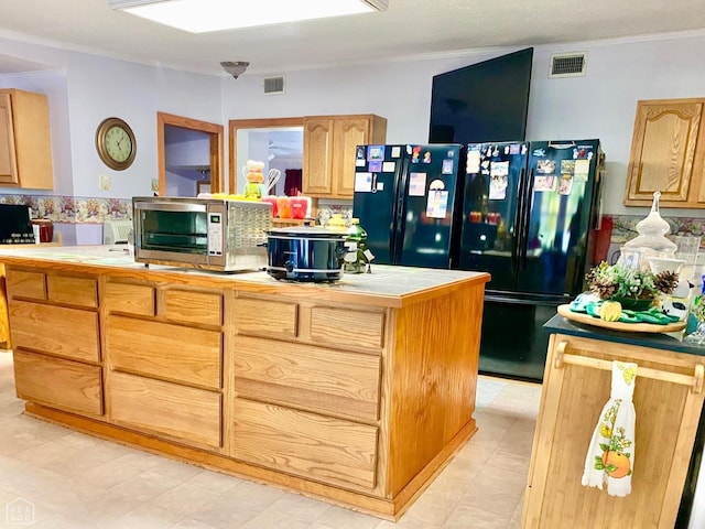 3601 Palestine Rd, Warm Springs, AR 72478 - kitchen featuring visible vents, freestanding refrigerator, stainless steel microwave, and tile counters