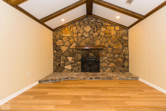 1805 Covey Dr, Jonesboro, AR 72404 - unfurnished living room with wood finished floors and a fireplace