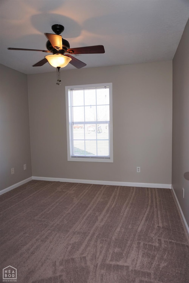 1805 Covey Dr, Jonesboro, AR 72404 - carpeted spare room featuring ceiling fan and baseboards