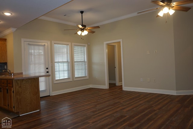 1805 Covey Dr, Jonesboro, AR 72404 - unfurnished dining area featuring ceiling fan, crown molding, dark wood-style flooring, and recessed lighting