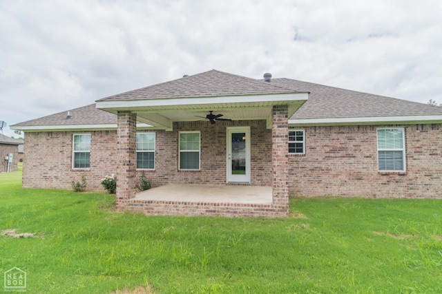 1805 Covey Dr, Jonesboro, AR 72404 - rear view of property with ceiling fan, a patio area, roof with shingles, a lawn, and brick siding