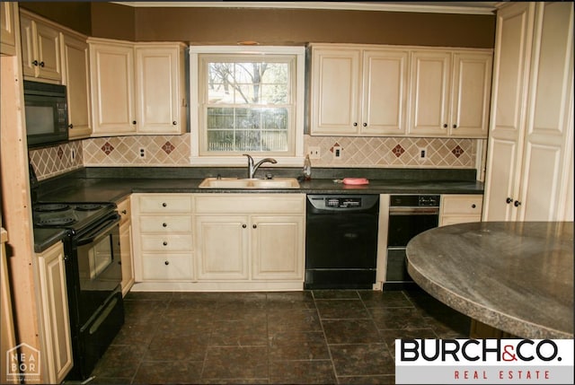 1805 Covey Dr, Jonesboro, AR 72404 - kitchen featuring black appliances, dark countertops, tasteful backsplash, and cream cabinets