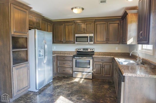1805 Covey Dr, Jonesboro, AR 72404 - kitchen featuring appliances with stainless steel finishes and a sink