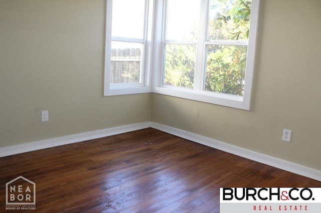 1805 Covey Dr, Jonesboro, AR 72404 - unfurnished room featuring dark wood finished floors and baseboards