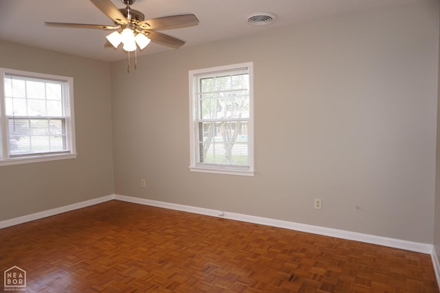 1805 Covey Dr, Jonesboro, AR 72404 - spare room featuring healthy amount of natural light and a ceiling fan