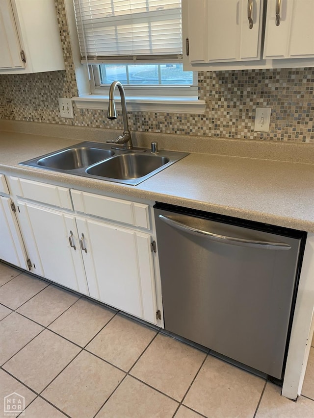 1805 Covey Dr, Jonesboro, AR 72404 - kitchen featuring dishwasher, white cabinetry, backsplash, and light tile patterned flooring
