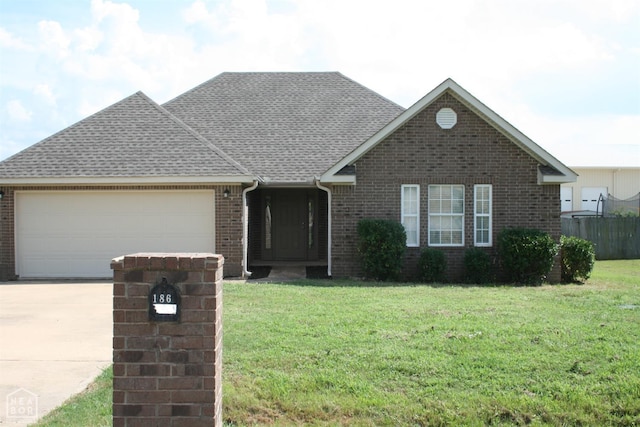 1805 Covey Dr, Jonesboro, AR 72404 - ranch-style house with concrete driveway, a garage, brick siding, and roof with shingles